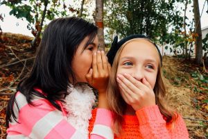 girls whisper