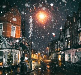 rain of snow in town painting