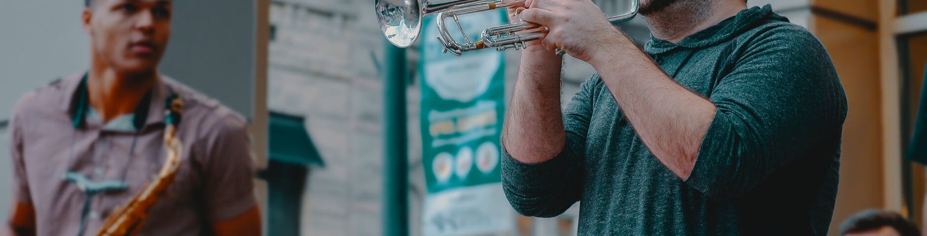 man playing wind instrument