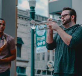 man playing wind instrument
