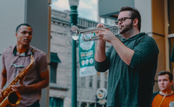 man playing wind instrument