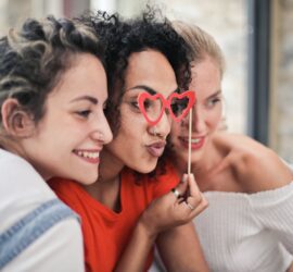 three women posing for photo